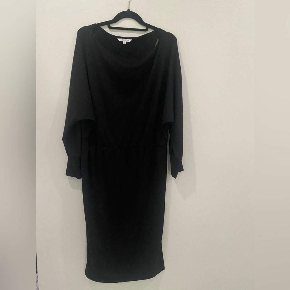 Comfortable, black dress that is perfect for a dinner